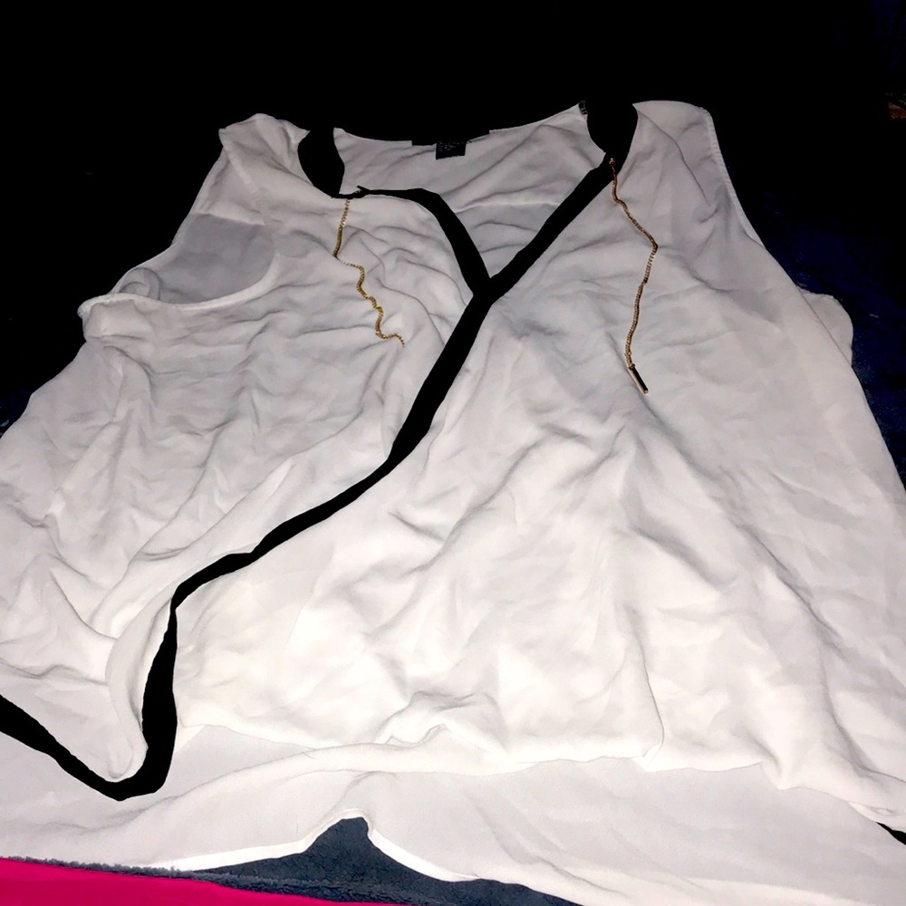 The brand is new look 3X 60% cotton 40% polyester